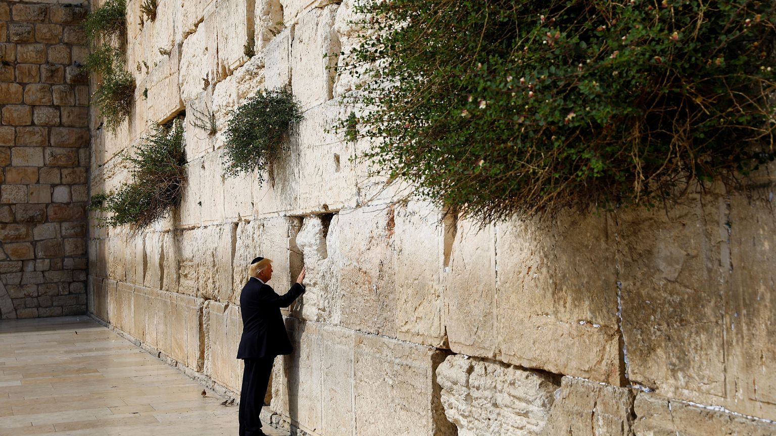 Image: Trump touches the Western Wall, Judaism's holiest prayer site, in Je