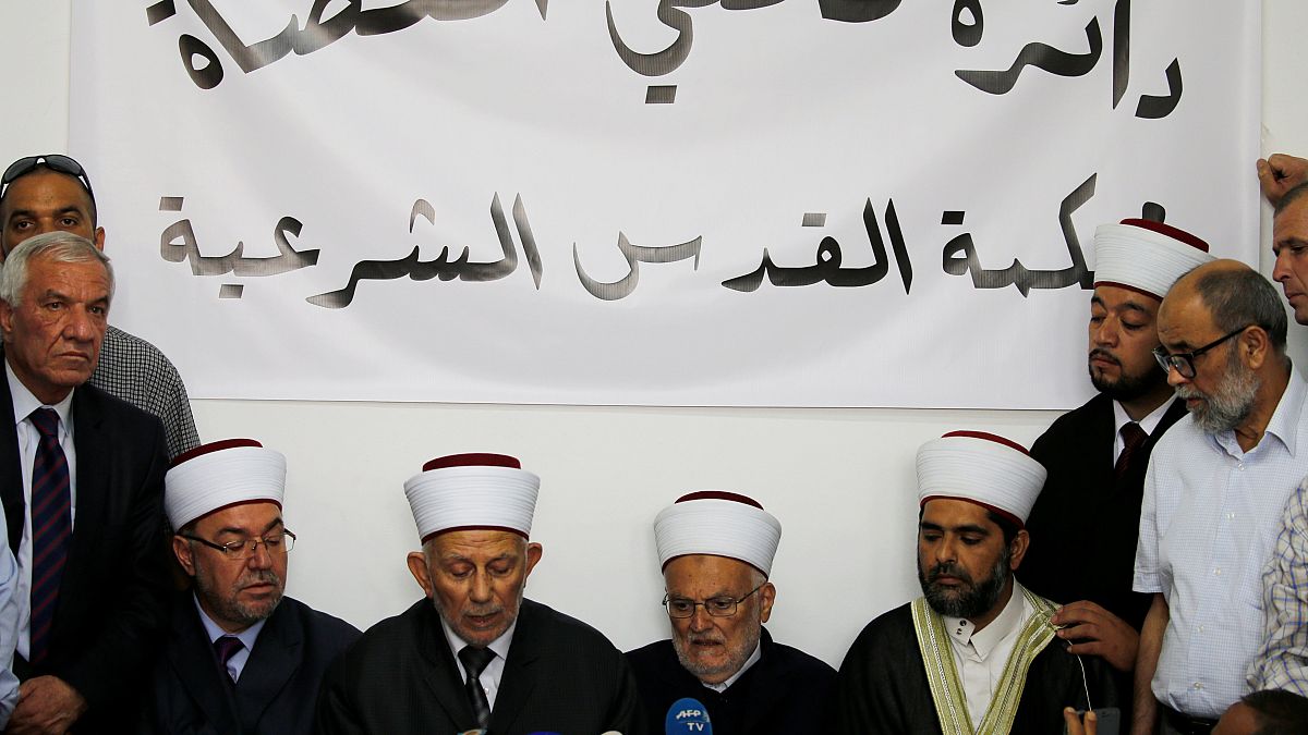 Muslim leaders in Jerusalem call for return to prayer at Al Aqsa mosque after Israel scales back security measures