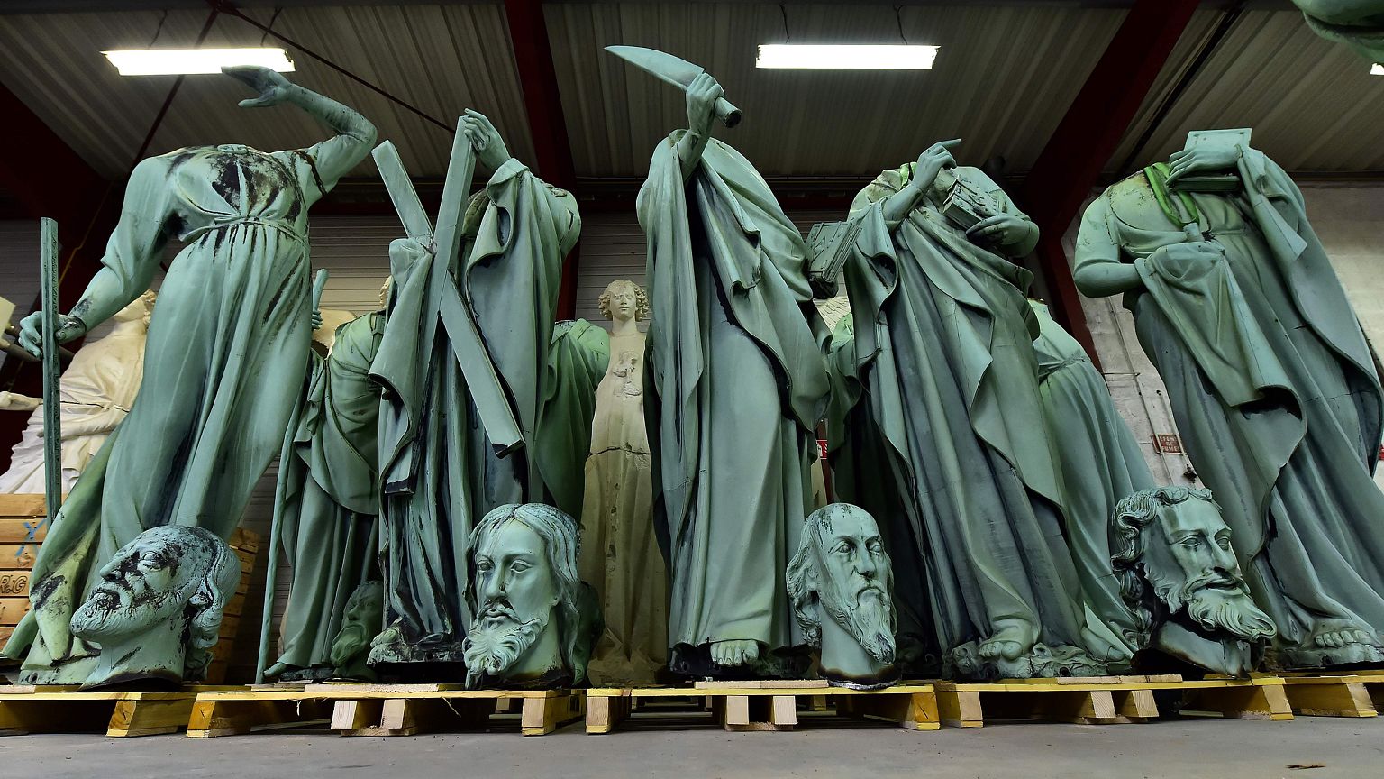 Image: Statues that around Notre Dame were recently removed for restoration