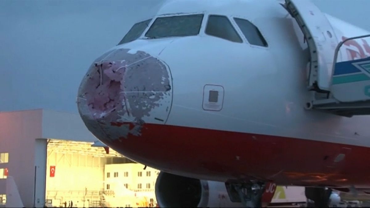 Plane damaged in freak storm in Turkey