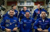 Astronauts safely join ISS