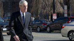 Image: Special Counsel Robert Mueller walks to his car after attending serv