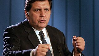 Image: Peruvian President Alan Garcia takes questions at a news conference