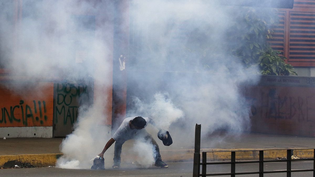 Outbreaks of violence in Venezuela as voters trickle to the polls to elect a 'super assembly.'