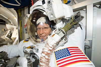 Expedition 50 Flight Engineer Peggy Whitson is suited up in the U.S. Quest airlock getting ready for her record-breaking eighth spacewalk on March 30 , 2017.