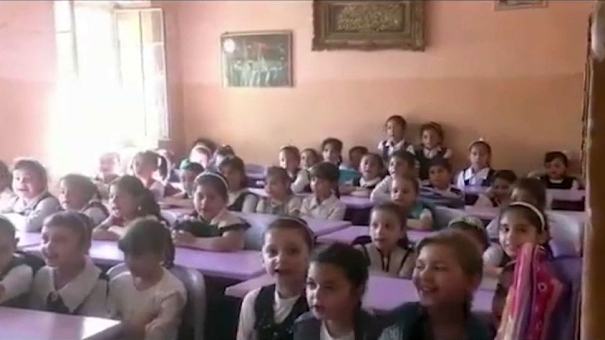 عودة الأطفال إلى المدارس في الموصل رغم حرارة الصيف
