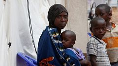 Image: A Congolese woman and her children who are suspected Ebola patients 
