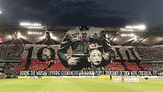 Football fans unfurl provocative World War II banner