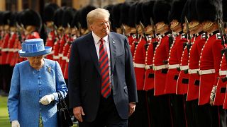 Image: Queen Elizabeth and President Donald Trump inspect the guard of hono