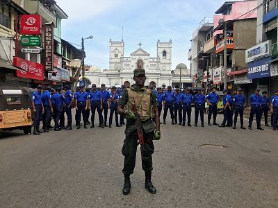 Military officials guard St. Anthony\'s Shrine in Colombo after Sunday\'s explosion.