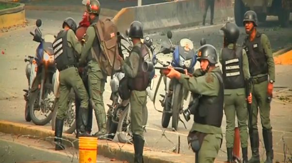 Venezuela eyetwitness: 'The policeman pointed his gun and shot me' Venezuela eyetwitness: 'The policeman pointed his gun and shot me'