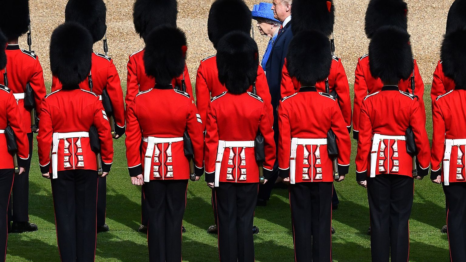 Image: Britain's Queen Elizabeth II and President Donald Trump inspect the 