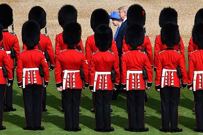 The Queen and Trump inspect the guard of honor formed of the Coldstream Guards at Windsor Castle on July 13, 2018.