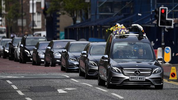 Image: The coffin of journalist Lyra McKee arrives at her funeral at St. An Image: The coffin of journalist Lyra McKee arrives at her funeral at St. An
