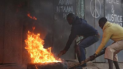 Kenya police fire teargas to contain opposition protests after Uhuru win