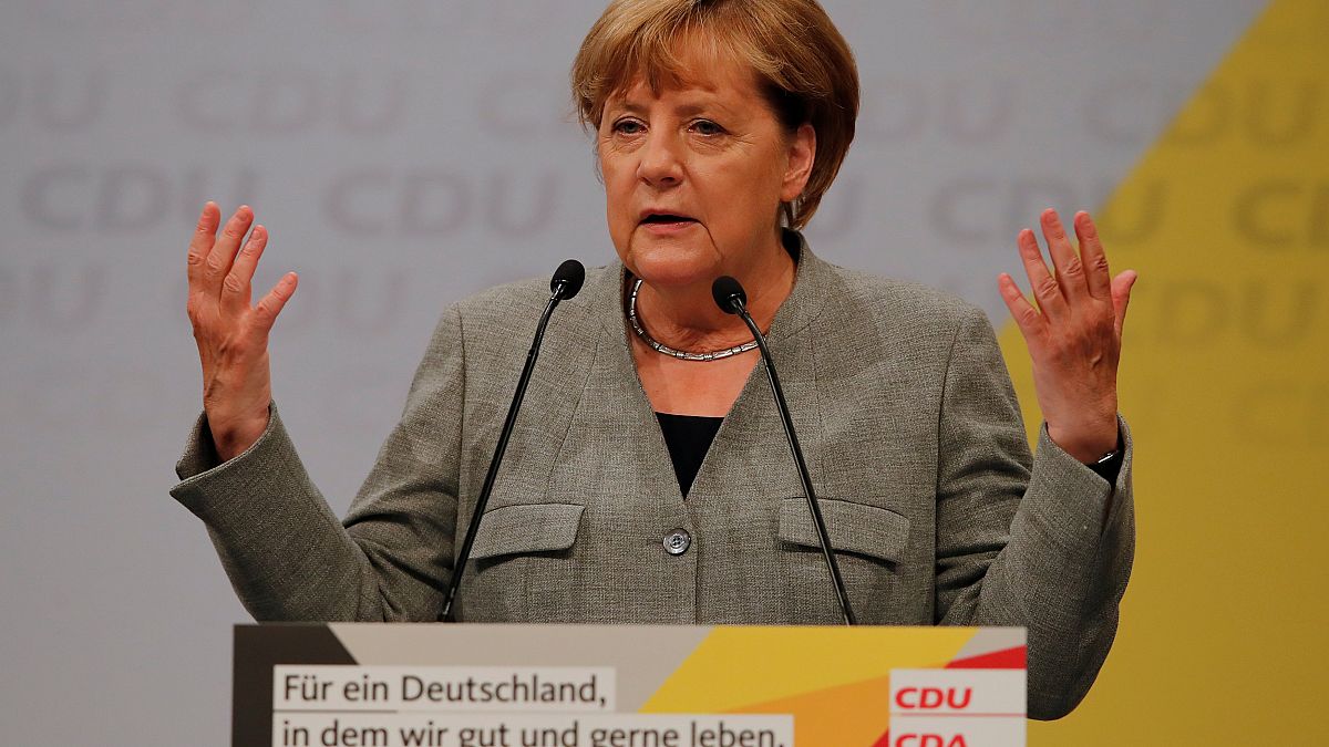 Merkel slams German auto execs during election rally