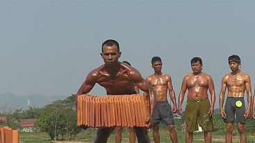 Flexing muscles in West Java