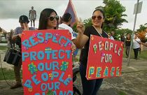 I residenti di Guam manifestano per la pace