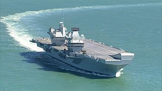 Britain's new warship, HMS Queen Elizabeth, heads for Portsmouth