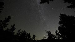 Image: Two Perseid meteors are seen near the Andromeda Galaxy, 2nd right an