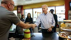 Image: Joe Biden greets people at Gianni's Pizza in Wilmington, Delaware, o