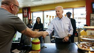 Image: Joe Biden greets people at Gianni's Pizza in Wilmington, Delaware, o