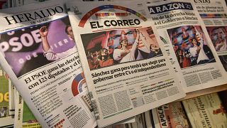 Image: Spanish newspapers in Pamplona, northern Spain, announce the victory