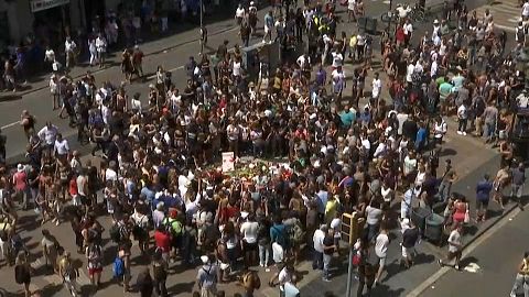Silence and solidarity as Barcelona pays tribute to terror victims