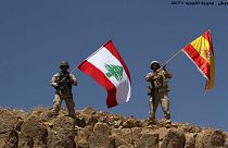 Lebanese soldiers raise Spanish flag in show of solidarity with attack victims