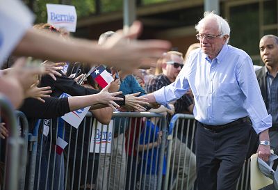 Democratic presidential candidate Sen. Bernie Sanders, I-Vt., Bernie Sanders greets supporters before speaking during a rally at Discovery Green on April 24, 2019, in Houston.