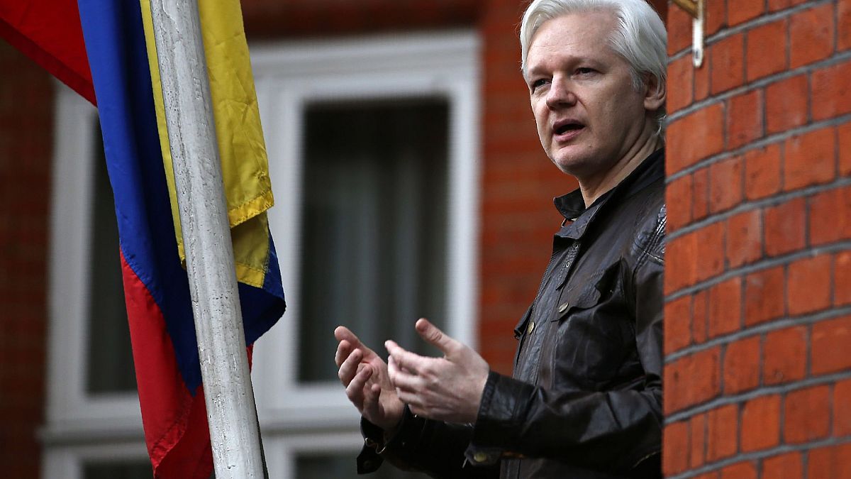 Image: Wikileaks founder Julian Assange speaks from a balcony at the Embass
