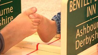 Watch: Competitors put best foot forward for toe-wrestling extravaganza