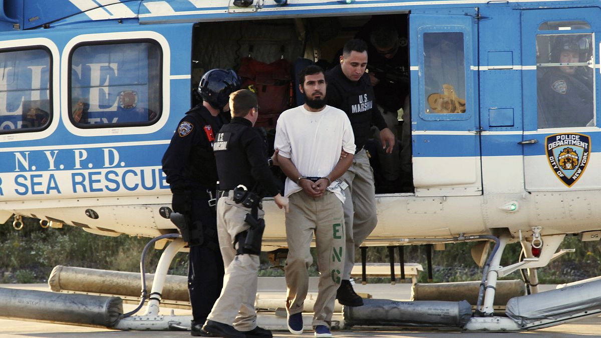Image: Najibullah Zazi is escorted by US Marshals at a New York Police Depa