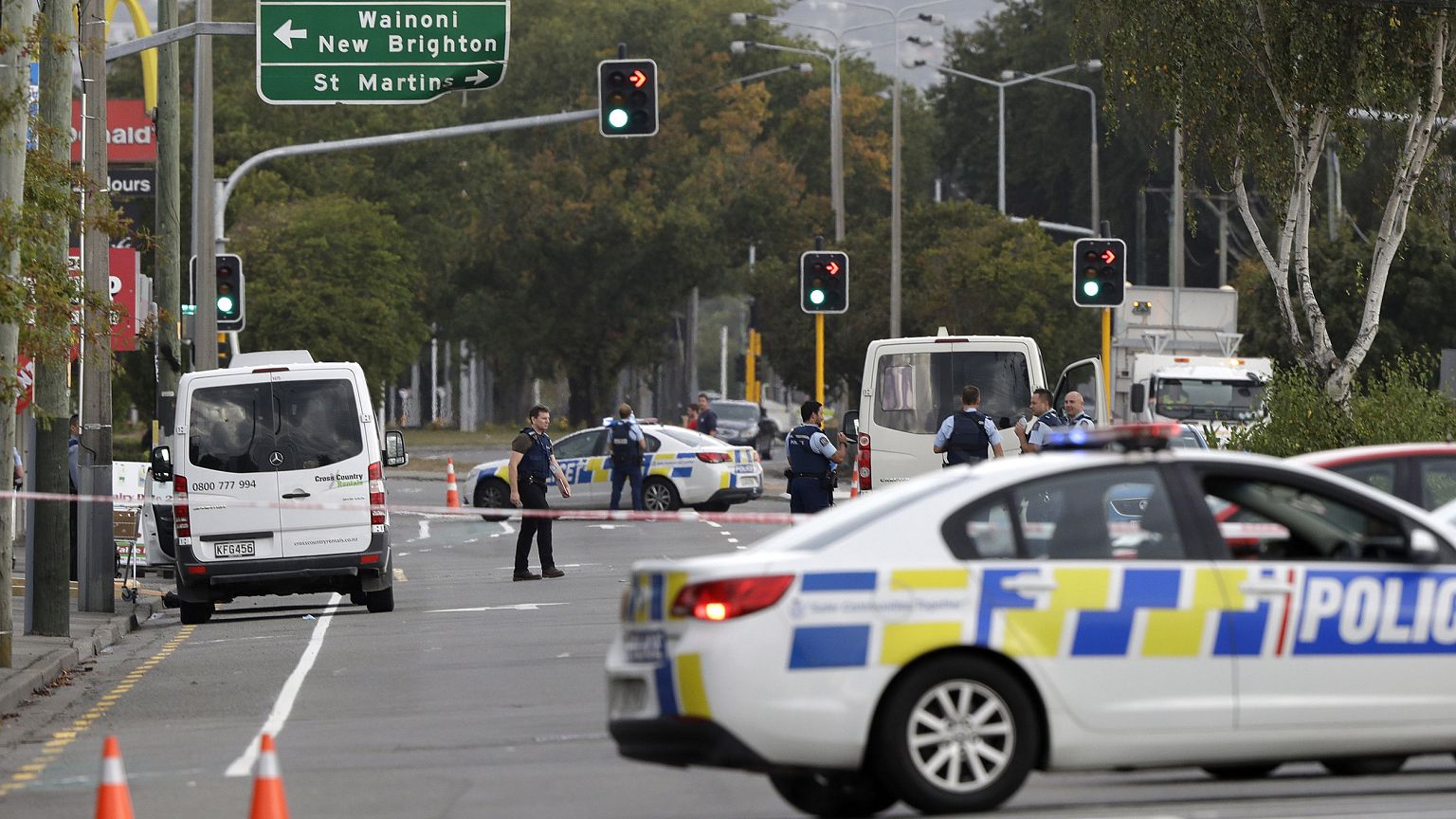 Image: Police stand outside a mosque in Linwood, Christchurch, New Zealand,