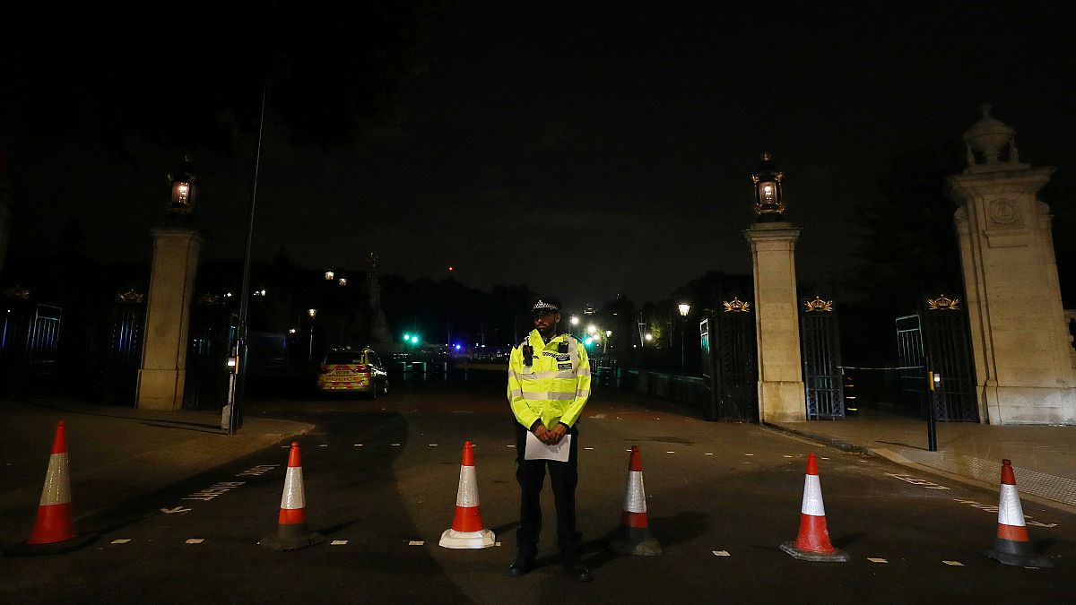 Man with weapon arrested outside Buckingham Palace in London