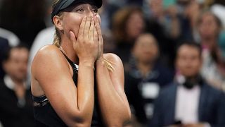 Sharapova vence a Halep en su regreso al Grand Slam