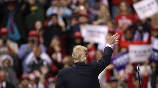Image: President Donald Trump waves to the crowd after speaking to supporte