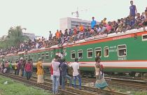 Bangladeshis swarm Dhaka trains to travel home for Eid al-Adha