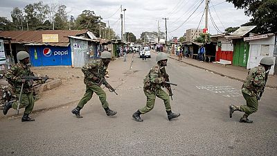 Gunmen kill two policemen at church on Kenya's coast/