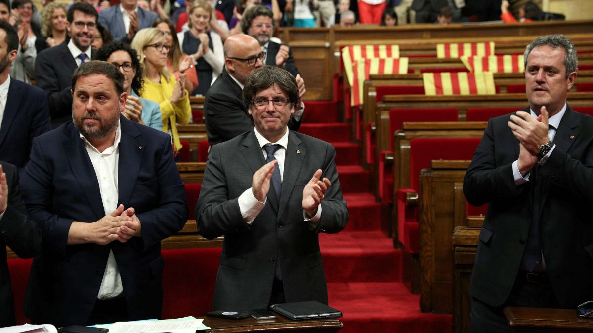 The Catalan parliament approves a law to call a referendum on October 1 on independence from Spain