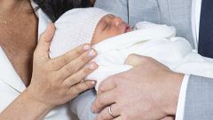Image: The Duke and Duchess of Sussex with their baby son, who was born on 