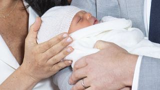 Image: The Duke and Duchess of Sussex with their baby son, who was born on 