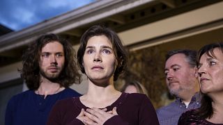 Image: Amanda Knox speaks to the media outside of her parents home in Seatt