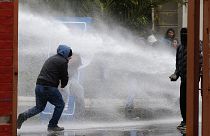 Chile clashes: violence breaks out during protest to mark coup anniversary