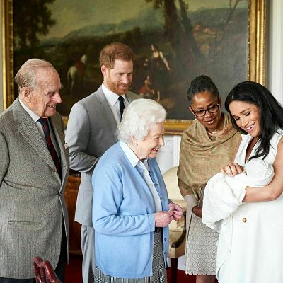 Prince Harry and Meghan, Duchess of Sussex, introduce their son, Archie Harrison Mountbatten-Windsor, to Queen Elizabeth and Meghan\'s mother, Doria Ragland, at Windsor Castle on May 8, 2019.