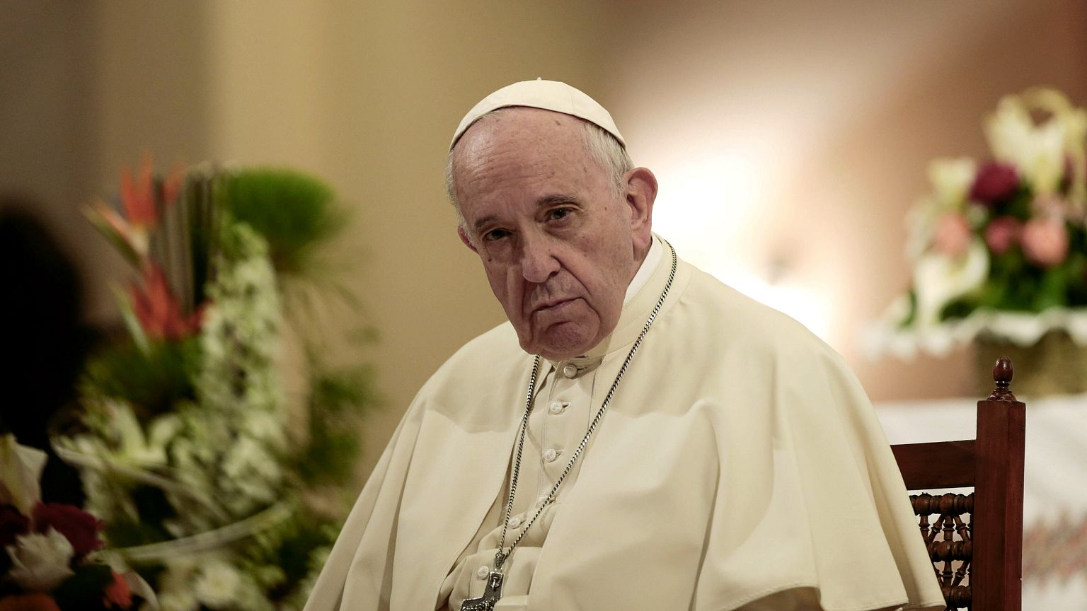 Image: Pope Francis sits during a meeting with Catholic priests and other r