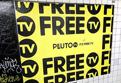 An advertisement for Pluto TV is displayed on the wall of a subway station in New York on March 14, 2019.