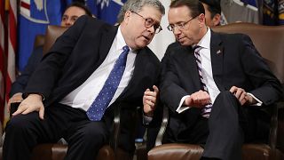 Image: Attorney General William Barr talks with Deputy Attorney General Rod