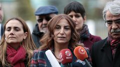 Turkish politician forced to dig up mother's grave after threats