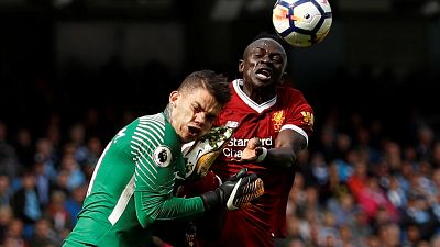 Liverpool's Senegalese forward Mane will not change style despite ban